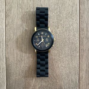Michael Kors Gold Black Rubber Oversized Women’s Watch measures 6.5”